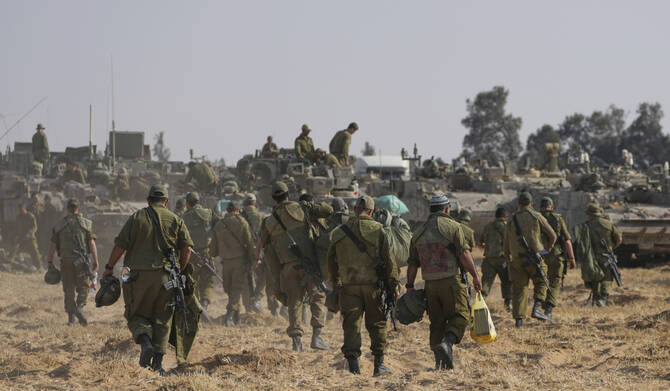 Israeli soldiers are seen at a staging ground near the border with the Gaza Strip, in southern Israel, Tuesday, April 30, 2024. (AP)