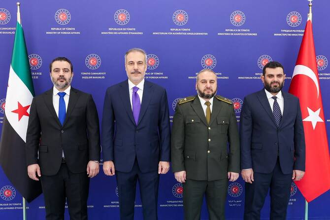 Syrian Foreign Minister Asaad Al Shaibani alongside Turkish Foreign Minister Hakan Fidan, Syrian Defence Minister Murhaf Abu Qasra and Head of Syrian Intelligence Hussein Al Salama during a meeting in Ankara, Turkiye. (Handout by the Turkish FM Press Service)