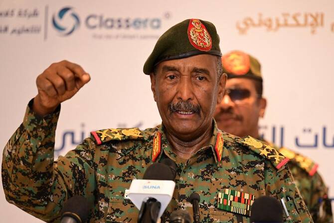 One of General Abdel Fattah Al-Burhan’s decrees brought all the other armed groups fighting alongside the army under his control. (AFP)