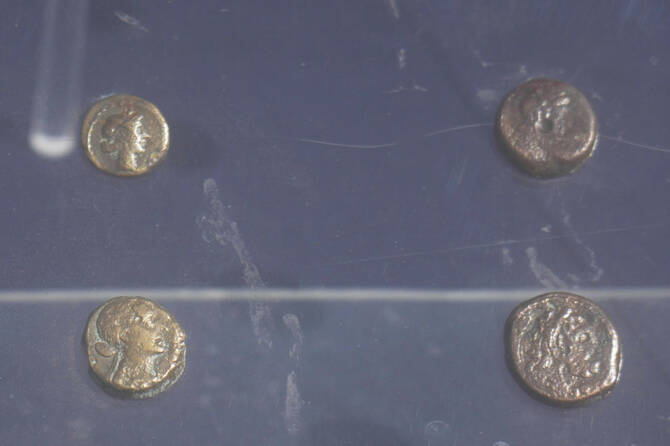 Ancient Roman coins are on display after they were lifted out of the water in Abu Qir Bay at he Mediterranean city of Alexandria, Egypt, Thursday, Aug. 21, 2025. (AP)