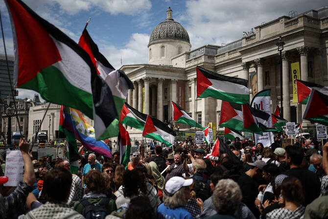 Activists rally at Trafalgar Square in London on June 23, 2025, calling for UK recognition of the State of Palestine. (AFP)