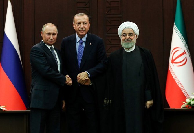 ロシアのヴラジーミル・プーチン大統領、トルコのレジェップ・タイイップ・エルドアン大統領、イランのハッサン・ロウハニ大統領（左から）。2019年9月16日にアンカラで開かれたシリアに関する三カ国協議で。（AFP）