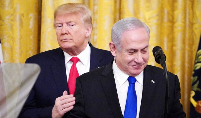 ドナルド・トランプ米大統領とイスラエルのベンジャミン・ネタニヤフ首相は、ワシントンDCのホワイトハウスのイーストルームでトランプの中東和平計画の発表に参加。2020年1月28日（AFP通信）