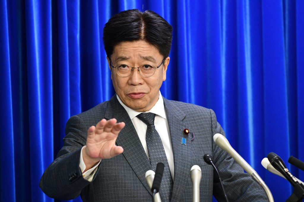 加藤勝信厚労相は会議の冒頭、「この時期に患者の増加のスピードを可能な限り抑制することは極めて重要」と強調。(AFP)