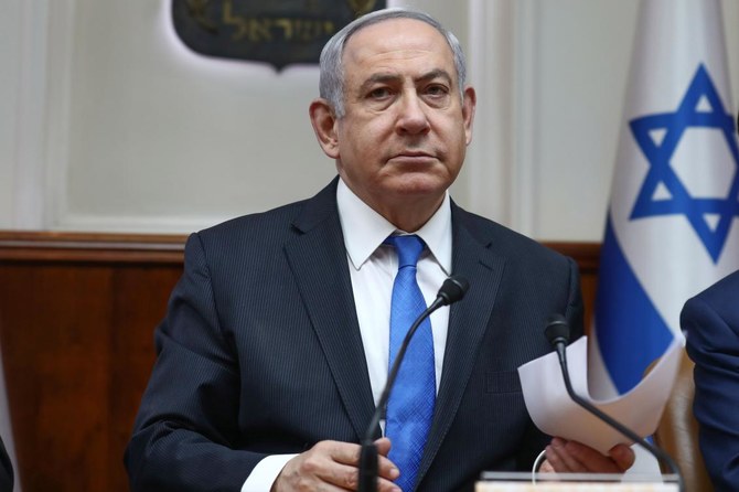 2020年2月16日に撮影されたこの資料写真では、イスラエルのベンヤミン・ネタニヤフ 首相が2020年2月16日のエルサレムで、毎週行われる閣議で議長を務めている。(AFP)