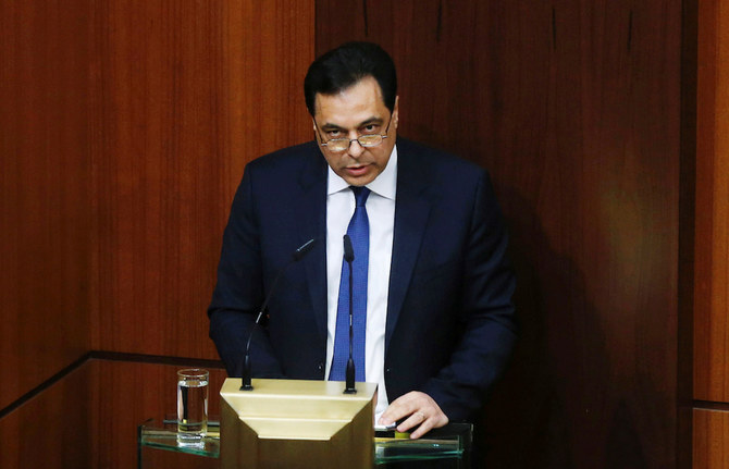 ベイルートで信任投票議会が行われている中、政府の政策声明を議会に提出するレバノンのハッサン・ディアブ首相。2月11日火曜日。（ロイター）　