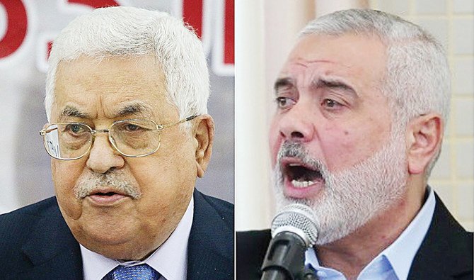 パレスチナのマフムード・アッバス大統領（左）とハマスの指導者イスマイル・ハニエ氏。
