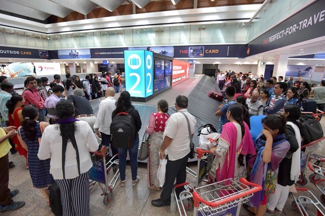 ドバイ国際空港は海外旅行で世界で最も混雑する空港だが、新型コロナウイルスの感染拡大を理由にイラン行きの便を制限している。（AFP 資料写真）