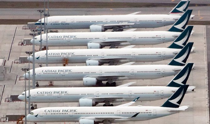 この2020年3月6日付のファイル写真では、キャセイパシフィック航空の旅客機が香港国際空港の駐機場に並ぶ姿が見える。 （AP）