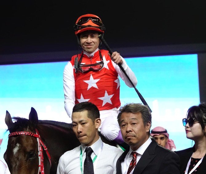 日本からの出場者も大きな勝利を収め、武豊を騎手とするフルフラットがサウジダービーレースで優勝する。(AN Photo/Huda Bashatah)