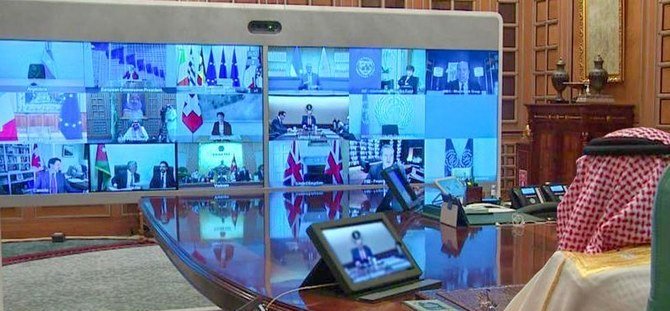 サウジアラビアのサルマン国王は、G20首脳による臨時会議の司会を務めた。全代表がテレビ会議で極限まで距離を置き、世界中から話をする。（SPA）