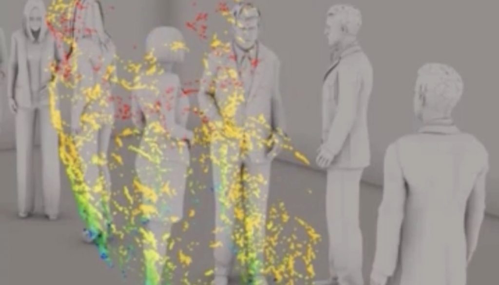 密閉された室内で誰かがくしゃみをしたあと、ミクロの粒子が拡散する様子を示すシミュレーション。（NHK）