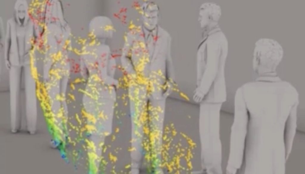 密閉された室内で誰かがくしゃみをしたあと、ミクロの粒子が拡散する様子を示すシミュレーション。(NHK)