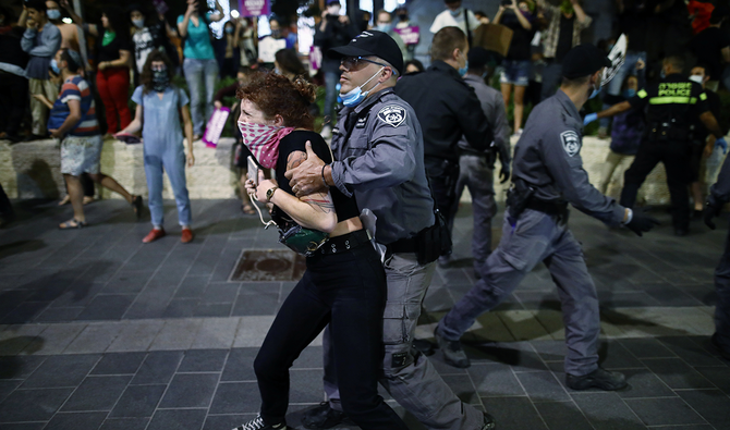 2020年6月9日、エルサレムでパレスチナ人に対するイスラエル軍の侵略に反対するデモに参加する人々。(ロイター)