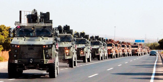 2020年2月2日、シリア北西部の反体制派が支配する地域に移動するトルコの軍用車列隊。(AP写真/ APTN /ファイル写真)