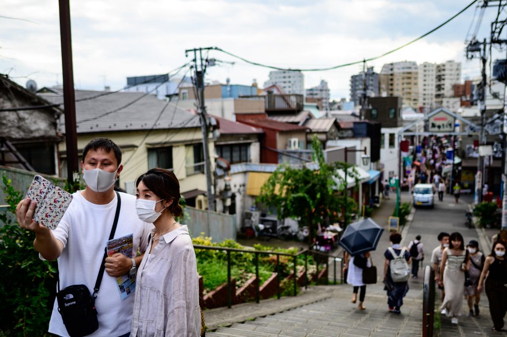 国内感染、新たに６０１人＝東京２日連続２００人超―新型コロナ (AFP)