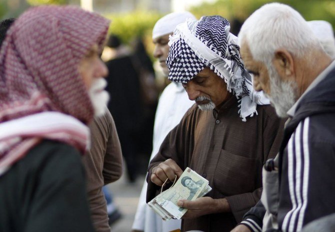 イランに対する米国の大規模な制裁措置が、イランの世界的な石油販売能力に圧力をかけ続けていることから、6月以降、リヤルの価値はドルに対して30%以上も下落している。(AFP提供写真)