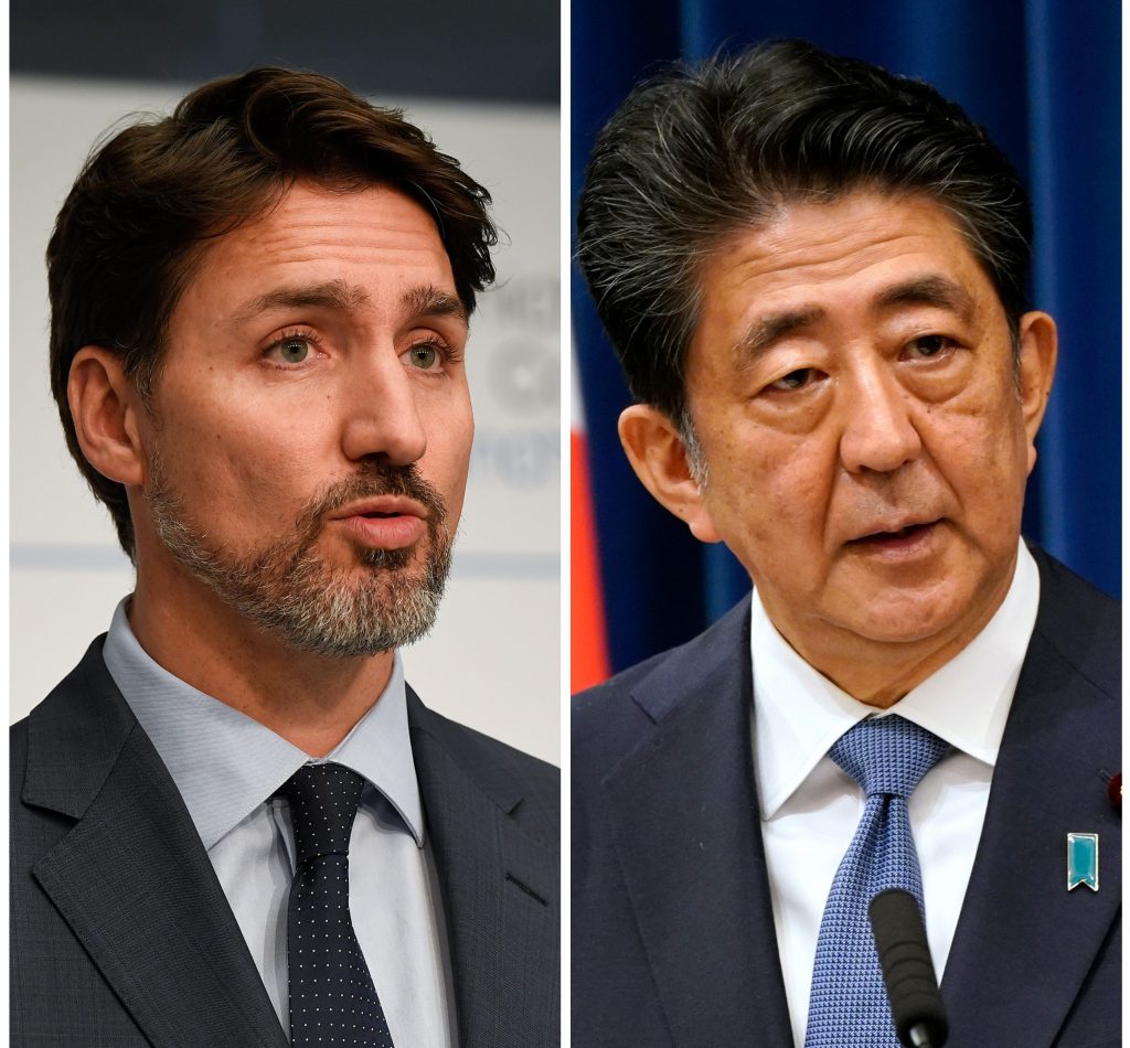 安倍氏は来年９月の任期切れを待たずに辞任することを説明。(AFP)