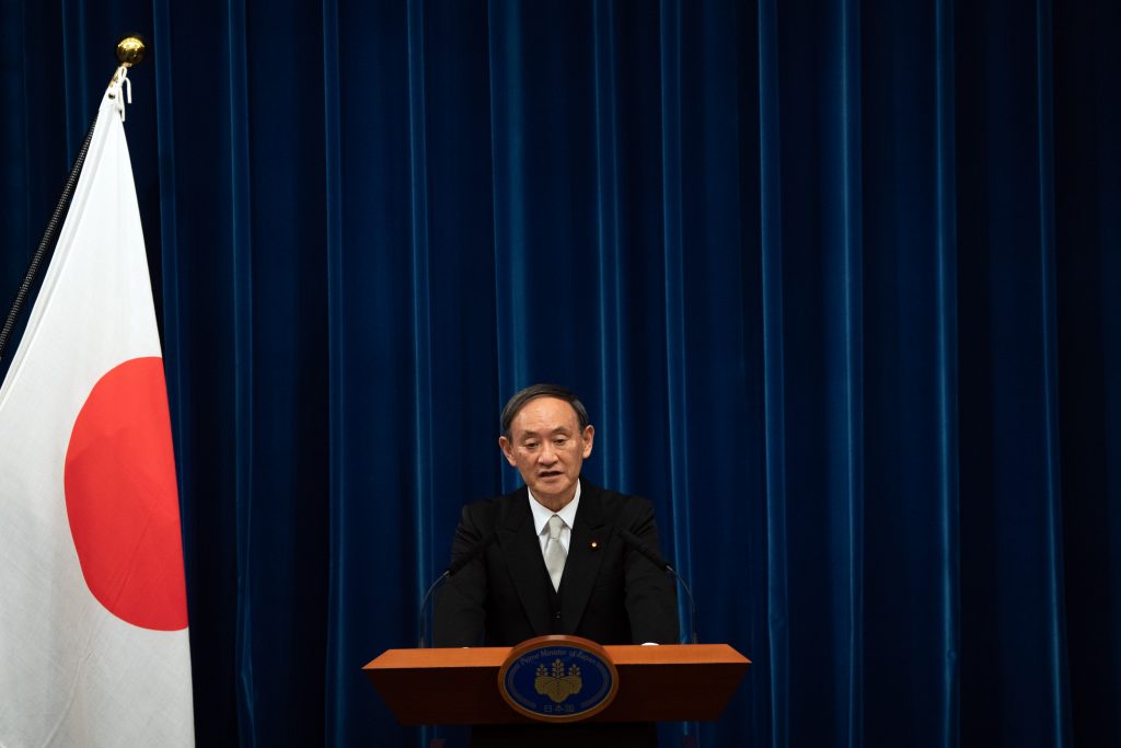 菅義偉首相は、2050年までにカーボン・ニュートラルな日本社会を実現する目標を掲げようとしている（AFP）