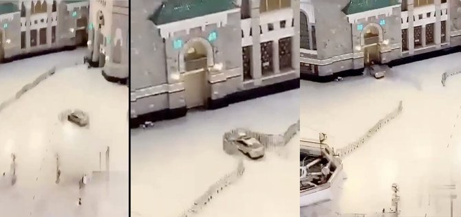 メッカの大モスクの扉に高速で突っ込む自動車を捉えたSNS上の動画から切り出した静止画。