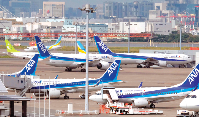 世界各国の入国制限によって乗客需要は深刻な影響を受けている、と日本最大の航空会社ANAホールディングスは発表した。(資料写真/AFP)