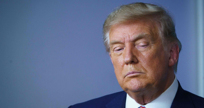 まだ敗北を認めないトランプ大統領。(AFP)