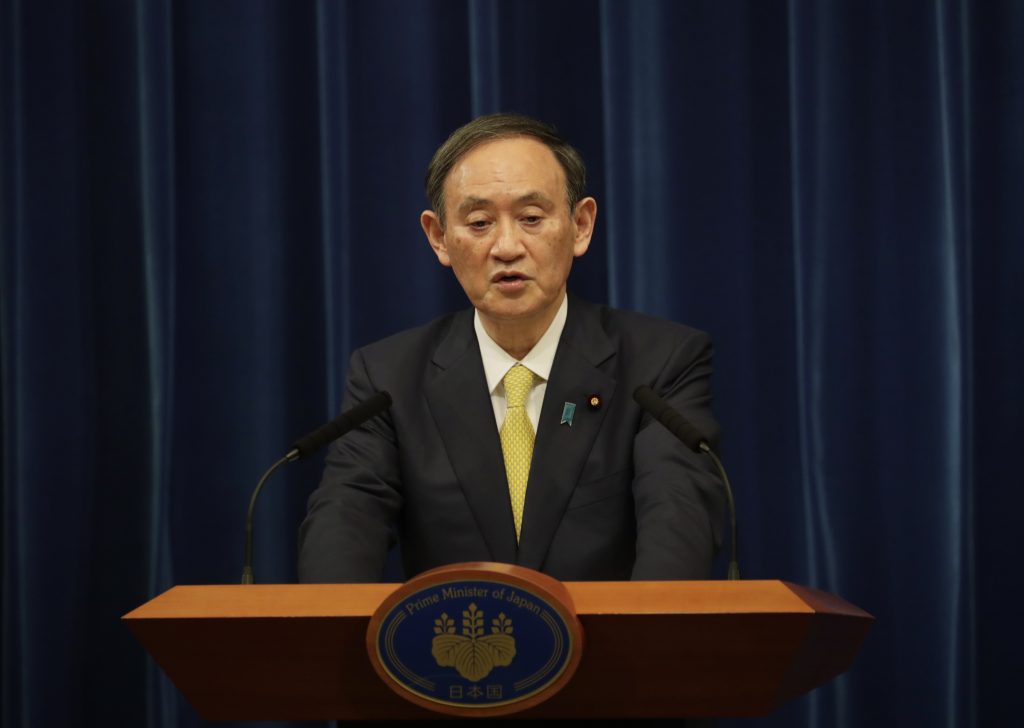 菅義偉首相は、国として非常事態に入る必要はないと繰り返し述べた。(AFP)