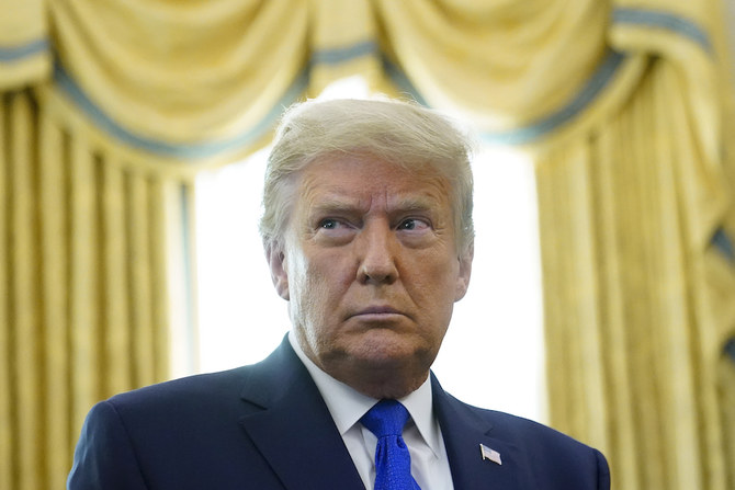 2020年12月7日、ワシントンのホワイトハウスの執務室でのドナルド・トランプ大統領の写真。トランプ氏は、アラブとイスラエルの和平を推し進める政権の努力の成果として、イスラエルとモロッコが関係を正常化すると発表した。(AP)
