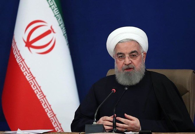 2020年12月14日にイラン大統領の公式サイトで公表された写真。テヘランでの記者会見中のハサン・ロウハニ大統領が写っている。（資料/AFP）
