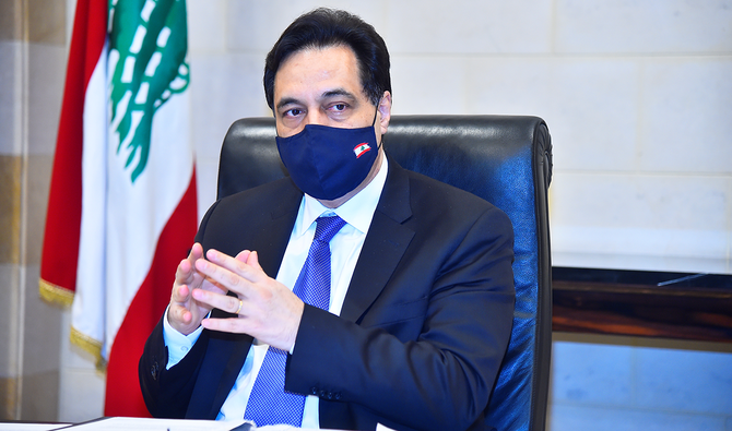 2020年12月29日、レバノンのベイルートでインタビューに応じるハッサン・ディアブ暫定首相。（ロイター通信）