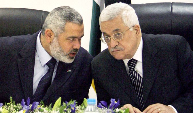 ハマースのリーダー、イスマーニール・ハニーヤとパレスチナ大統領マハムード・アッバース。( 提供 )