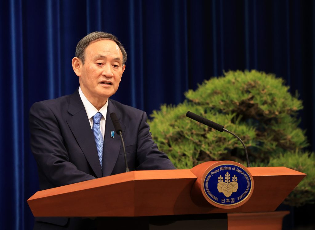 9月に就任した菅首相は、記録的な新規感染者数への政府対応についてますます高まるプレッシャーに直面してきた。(AFP)