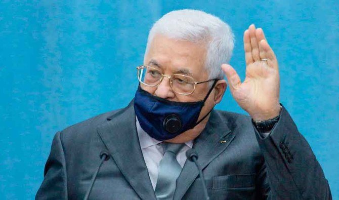 COVID-19パンデミックの中、パレスチナ指導者会合に出席するためヨルダン川西岸のラマッラ市にある大統領府に到着したパレスチナのマフムード・アッバース大統領。2020年5月7日。（AFP）