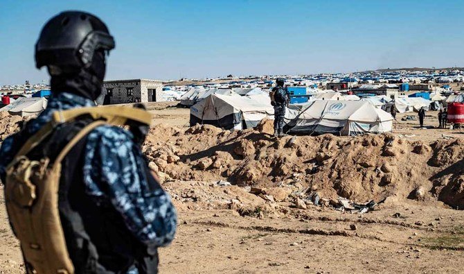 2021年3月30日、アルハウルキャンプの近くで監視を続けるシリア民主軍の特殊部隊。(AFP通信)