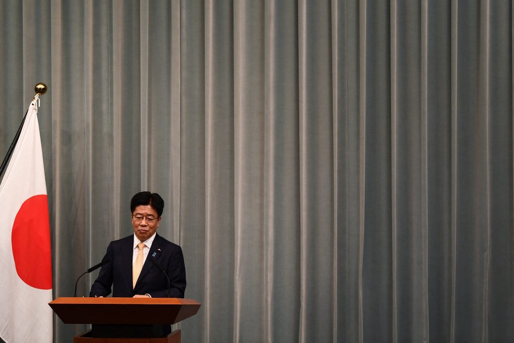加藤官房長官は「五輪を実現するとの日本政府の決意を支持する米国の立場に何ら変更はない」と述べた。（AFP）