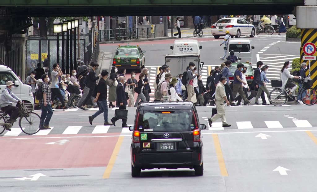 東京都では472人の感染が確認された。新規感染者の直近1週間平均は455人で、前週の78.4%だった。(AFP)