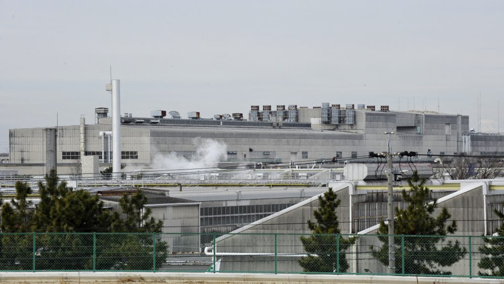 トヨタ自動車株式会社堤工場の正面玄関が見える全景。堤工場は日本の愛知県豊田市にあるハイブリッド車「プリウス」の生産拠点。(AFP通信)