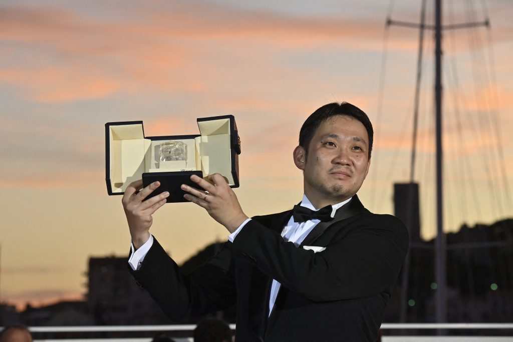 カンヌ映画祭では、2018年の「寝ても覚めても」以来2度目のコンペ入りで受賞を果たした。(AFP)