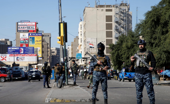 1月に2件の自爆テロが発生したバグダッドの中央市場の衛兵。イラクの治安当局は、混雑したバグダッドの市場で水曜日に爆発が発生し、9人以上が負傷したと伝えた。 （ロイター/ファイル写真）
