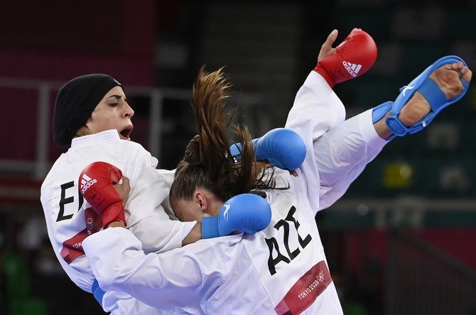 東京2020オリンピック女子組手61キロ超級空手競技の決勝戦でイリーナ・ザレツカ選手を2対0で破って、エジプトに栄光の金メダルをもたらしたフェルヤル・アブデラジズ選手。（AFP）