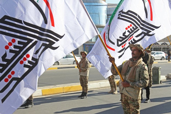ダーイシュとの戦いで登場したシーア派準軍事ネットワーク「アル・ハシュド・アル・シャアビ」は、イラクの政治・治安インフラに組み込まれた強大な力を持っている。（AFP通信）
