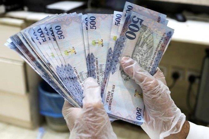 サウジアラビアの人口の60%が、未だ1週間に1回以上、紙幣を使用している。(ロイター)