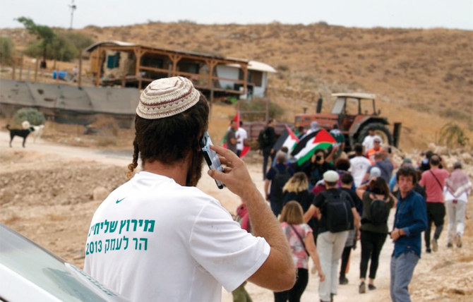 ヨルダン川西岸地区には50万人近くのユダヤ人入植者が住んでいる。（AFP通信）