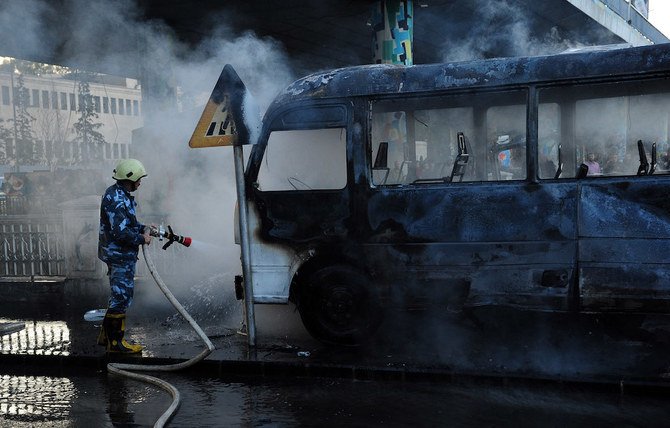 水曜日、ダマスカスで起きた軍用バスの爆撃で少なくとも13人が死亡した。