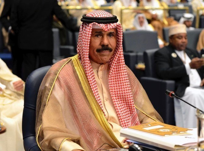 2014年3月26日水曜日のファイル画像において、首都クウェートのバヤン宮殿で開催された第25回アラブ・サミット閉会式に参列するクウェートのシェイク・アル・ナッワーフ・アル・アハマド・アル・ジャービル・アル・サバーハ皇太子。（AP）