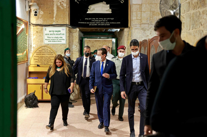  ヘルツォグ大統領の訪問はパレスチナ人とイスラエル人左派から広範な批判を招いた。(AFP)