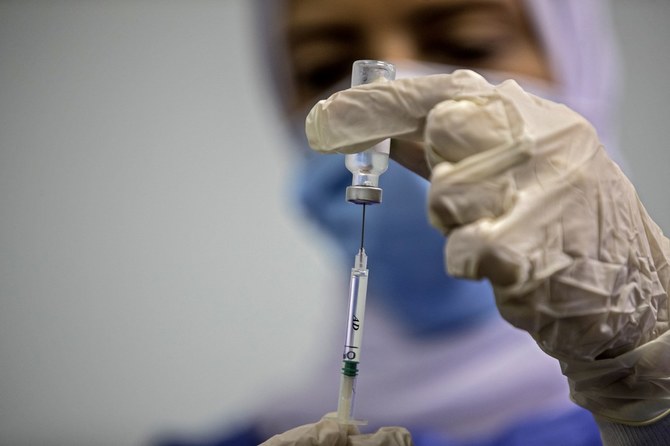 政府はワクチンの普及に役立つ傾向を把握するために、定期的に世論調査を実施している。（AFP）