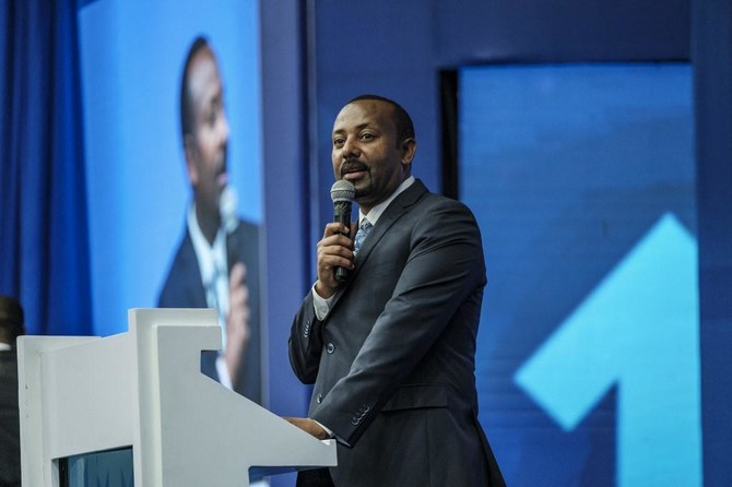 2022年3月11日、エチオピアのアディスアベバ市内で開かれた与党・繁栄党の第1回大会で演説するアビィ・アハメド首相。(AFP)