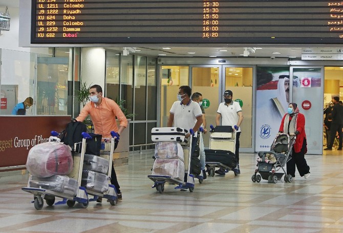 クウェートへの渡航者は、PCR検査を受けたり、ワクチン接種証明書を提示したりする必要がなくなる。（資料写真/AFP）