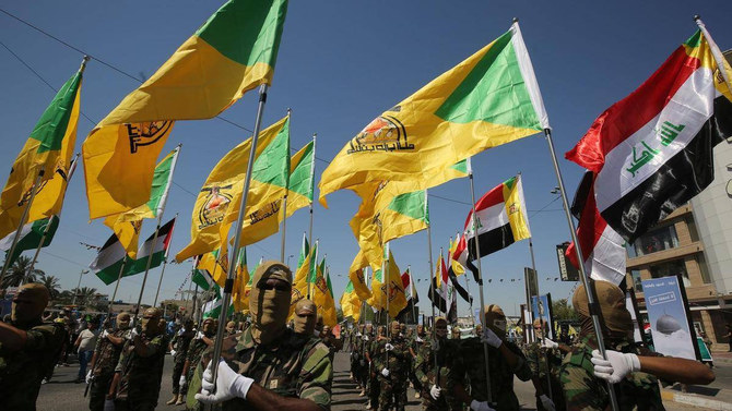 2019年5月31日、イラクのバグダッドで軍事パレードに参加する、イランが支援するカタイブ・ヒズボラの民兵。(AFP/ファイル)